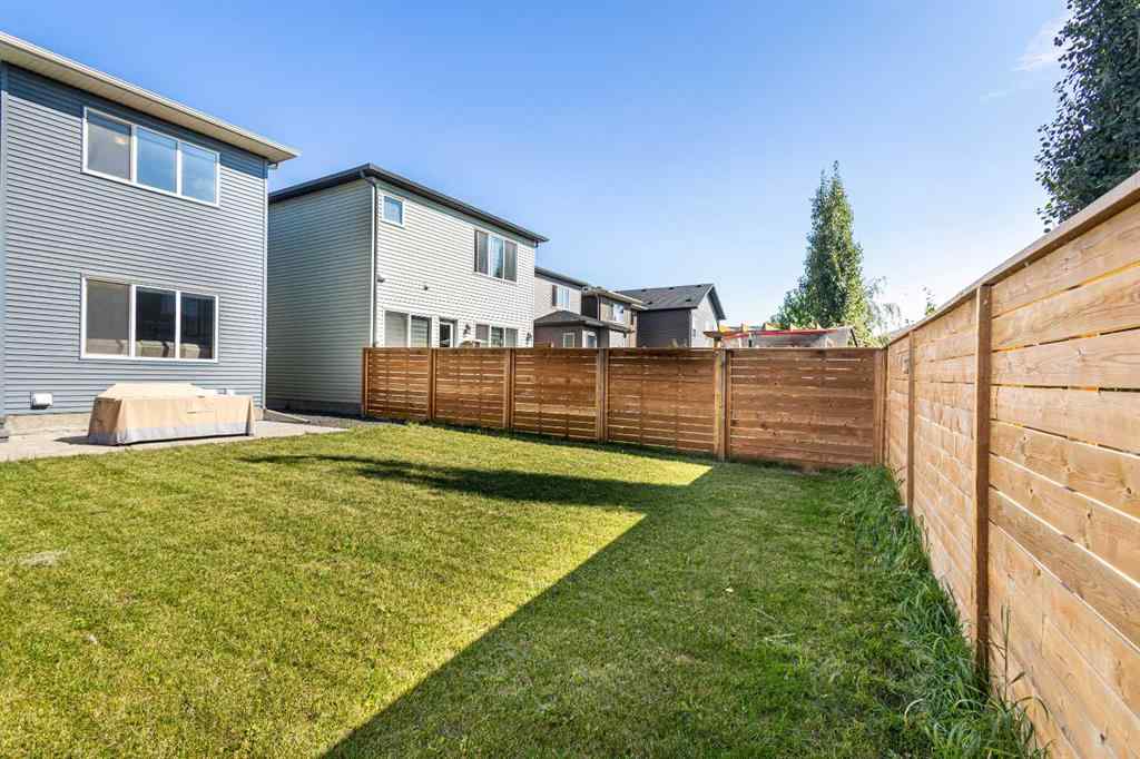 MLS® A2265561 - 33 Walcrest Way SE in Walden Calgary, Residential