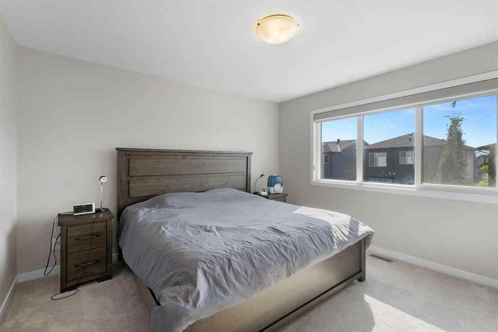 MLS® A2265561 - 33 Walcrest Way SE in Walden Calgary, Residential