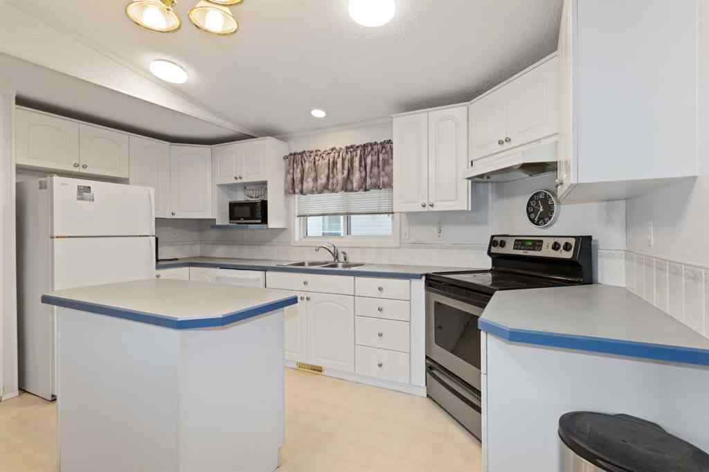 MLS® A2265565 - 210 Grant Way  in Gregoire Park Fort McMurray, Residential