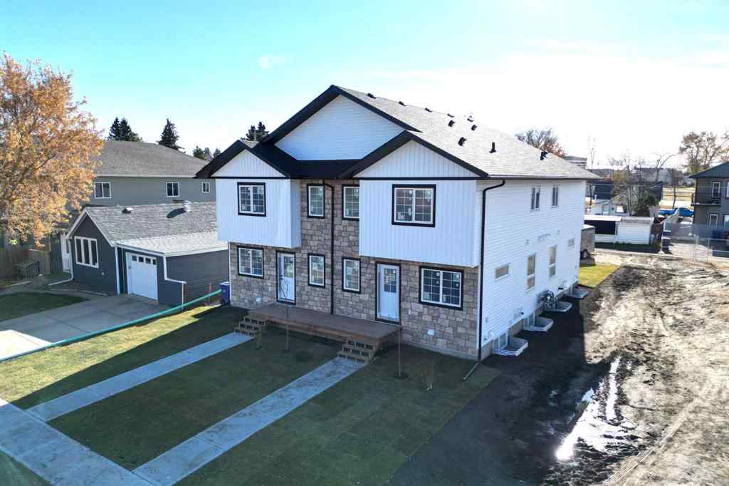 MLS® A2265569 - 5139 48th Street   in Central Innisfail Innisfail, Multi-Family