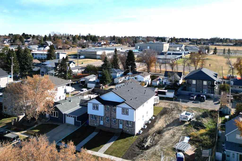 MLS® A2265569 - 5139 48th Street   in Central Innisfail Innisfail, Multi-Family