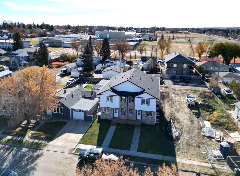 MLS® A2265569 - 5139 48th Street   in Central Innisfail Innisfail, Multi-Family