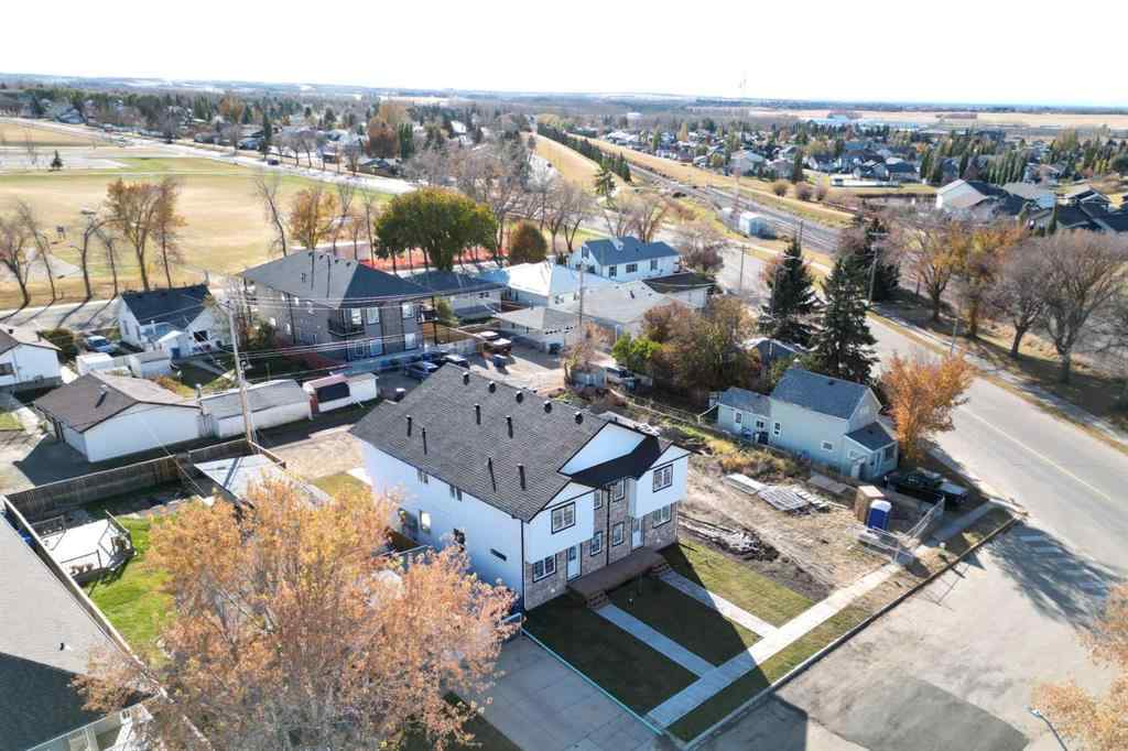 MLS® A2265569 - 5139 48th Street   in Central Innisfail Innisfail, Multi-Family