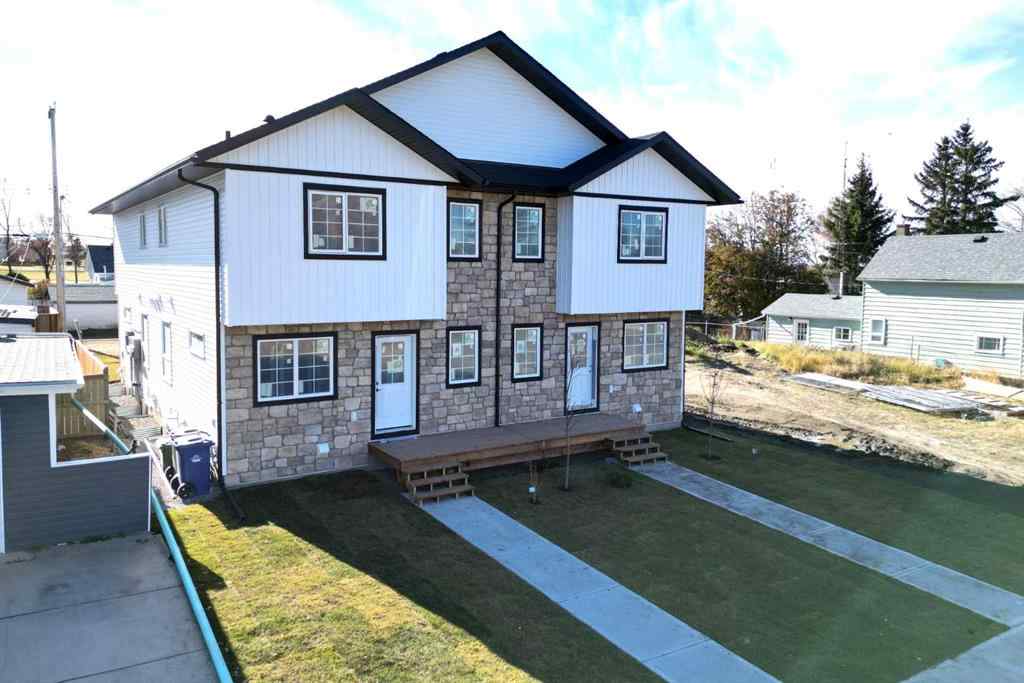 MLS® A2265569 - 5139 48th Street   in Central Innisfail Innisfail, Multi-Family