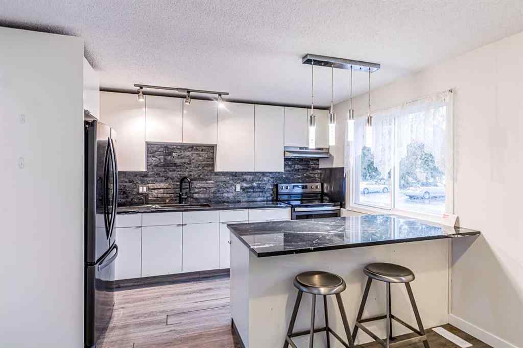 MLS® A2265583 - 212 Georgian Villas NE in Marlborough Park Calgary, Residential