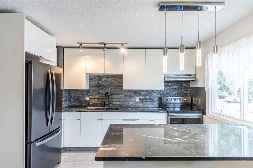 MLS® A2265583 - 212 Georgian Villas NE in Marlborough Park Calgary, Residential