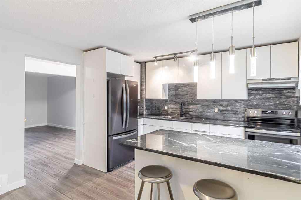 MLS® A2265583 - 212 Georgian Villas NE in Marlborough Park Calgary, Residential