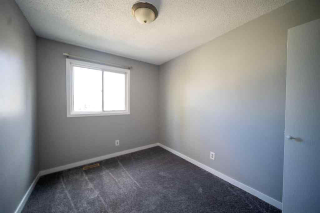 MLS® A2265583 - 212 Georgian Villas NE in Marlborough Park Calgary, Residential