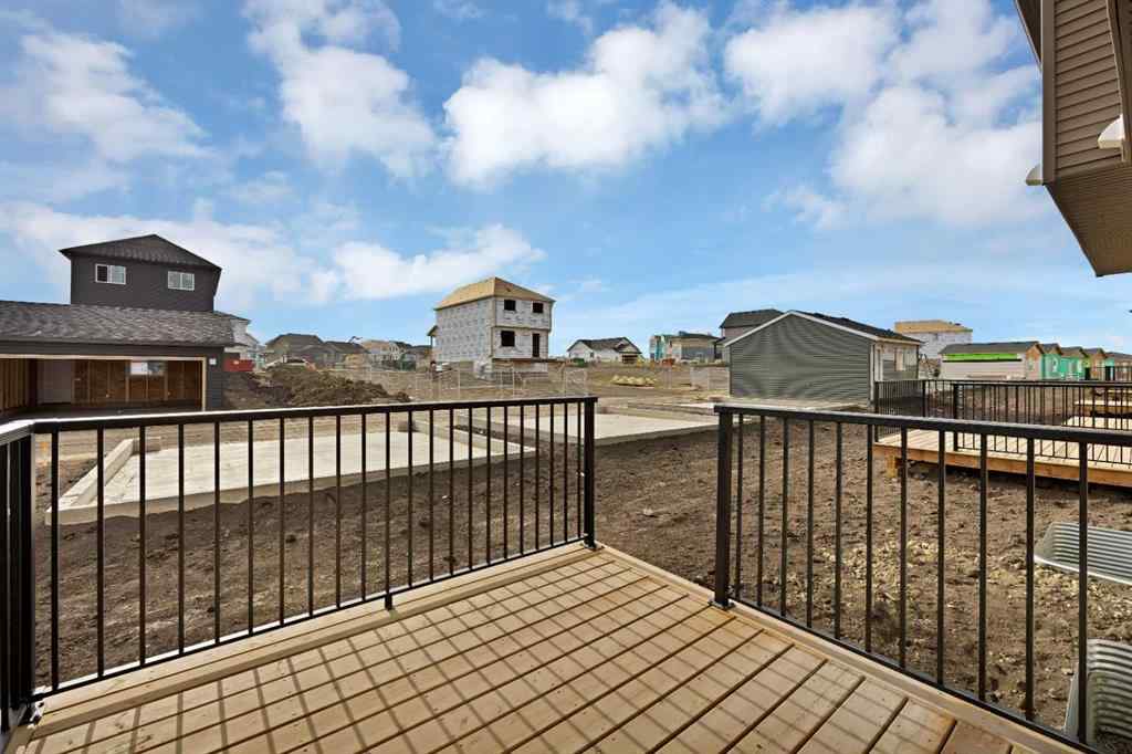 MLS® A2265590 - 5077 Harmony Circle  in Harmony Rural Rocky View County, Residential