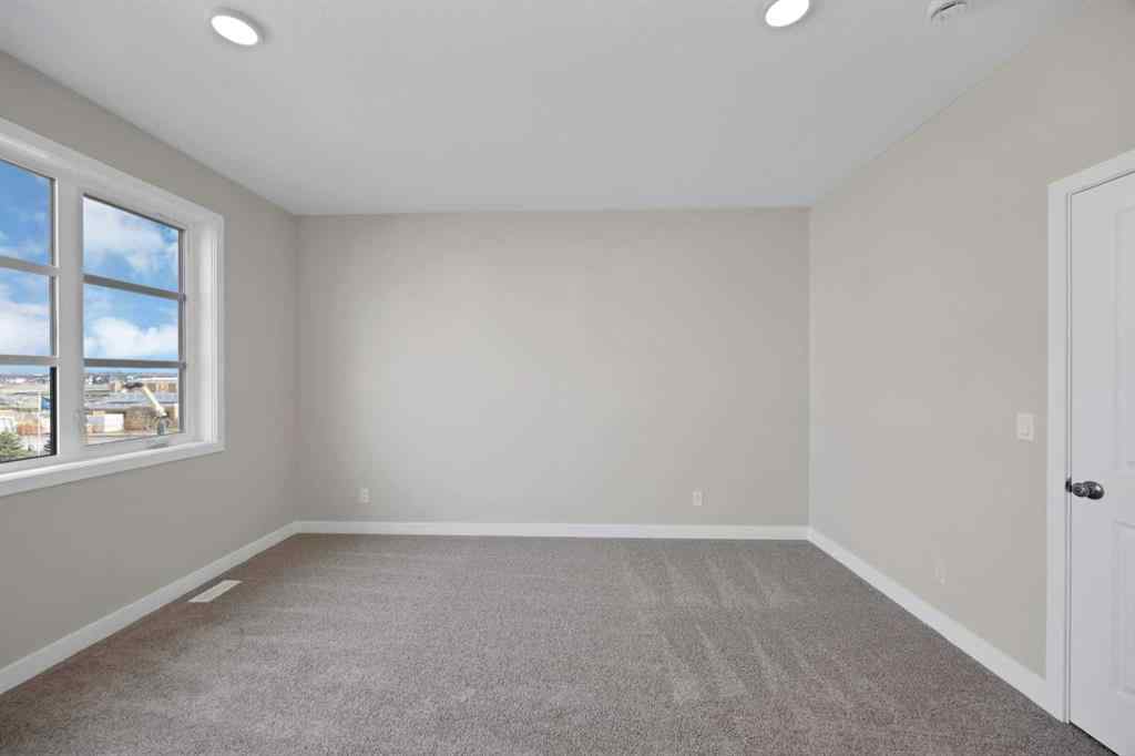 MLS® A2265590 - 5077 Harmony Circle  in Harmony Rural Rocky View County, Residential