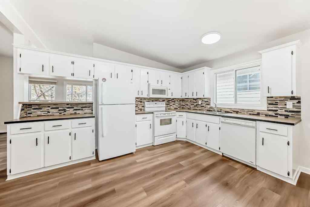 MLS® A2265596 - 6525 58 Street NW in Dalhousie Calgary, Residential