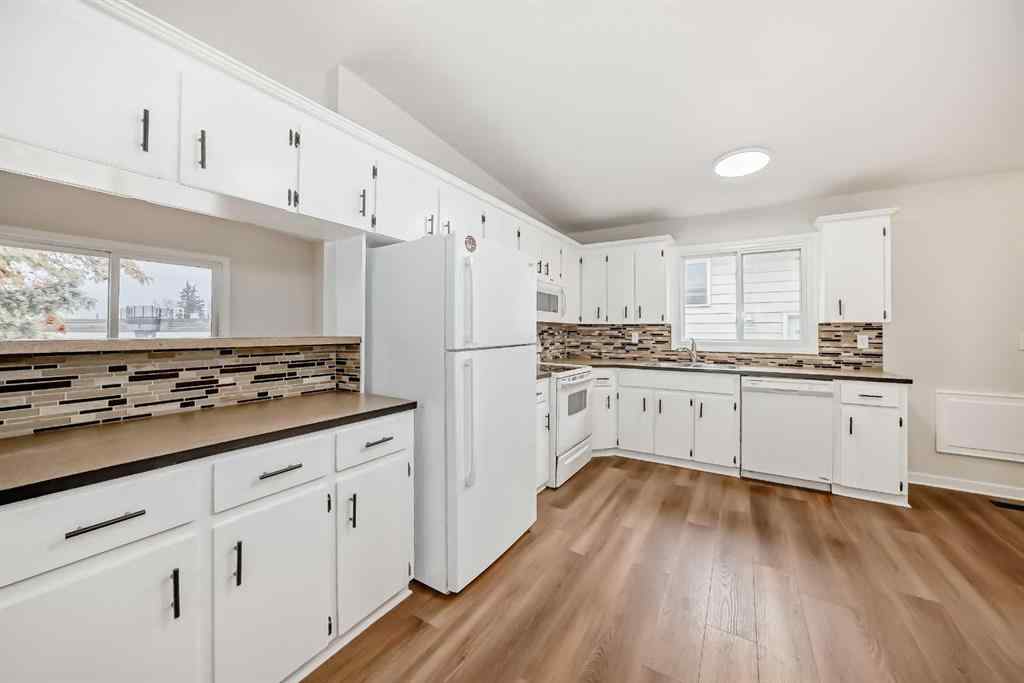 MLS® A2265596 - 6525 58 Street NW in Dalhousie Calgary, Residential