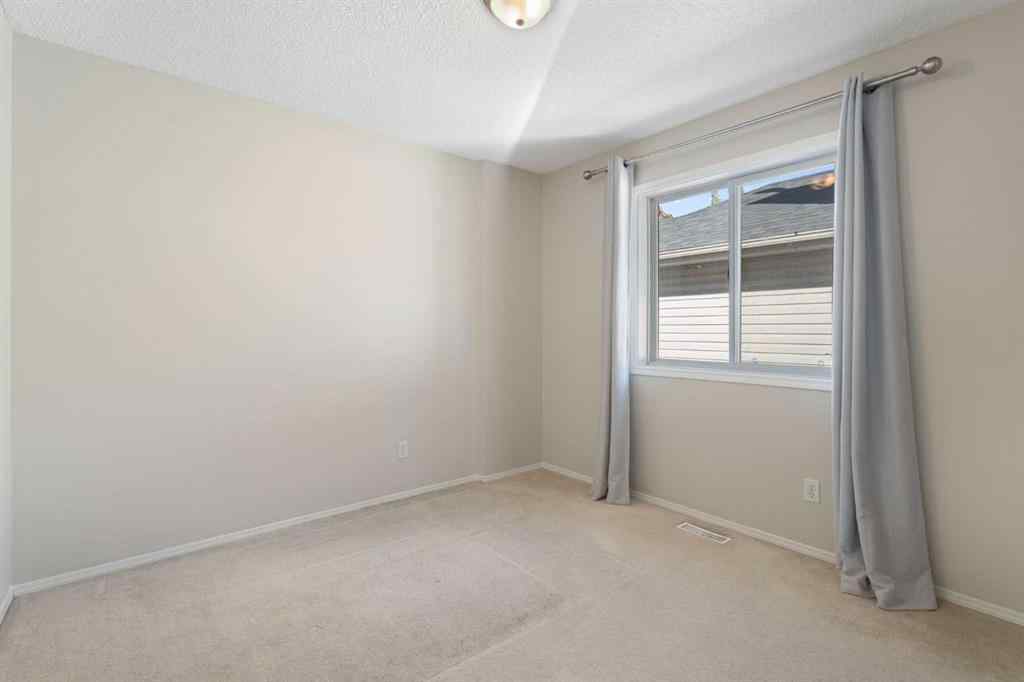 MLS® A2265624 - 165 Harvest Park Circle NE in Harvest Hills Calgary, Residential