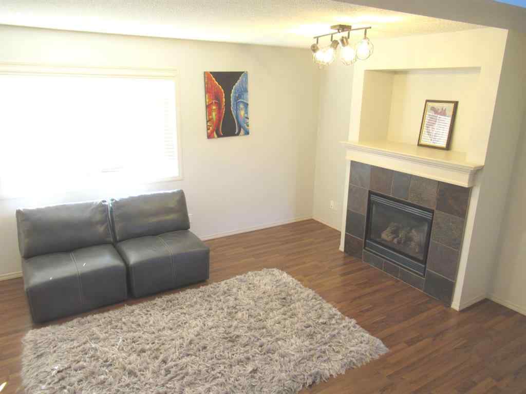 MLS® A2265627 - 105 Cimarron Park Circle  in Cimarron Okotoks, Residential