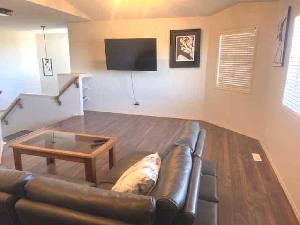 MLS® A2265627 - 105 Cimarron Park Circle  in Cimarron Okotoks, Residential