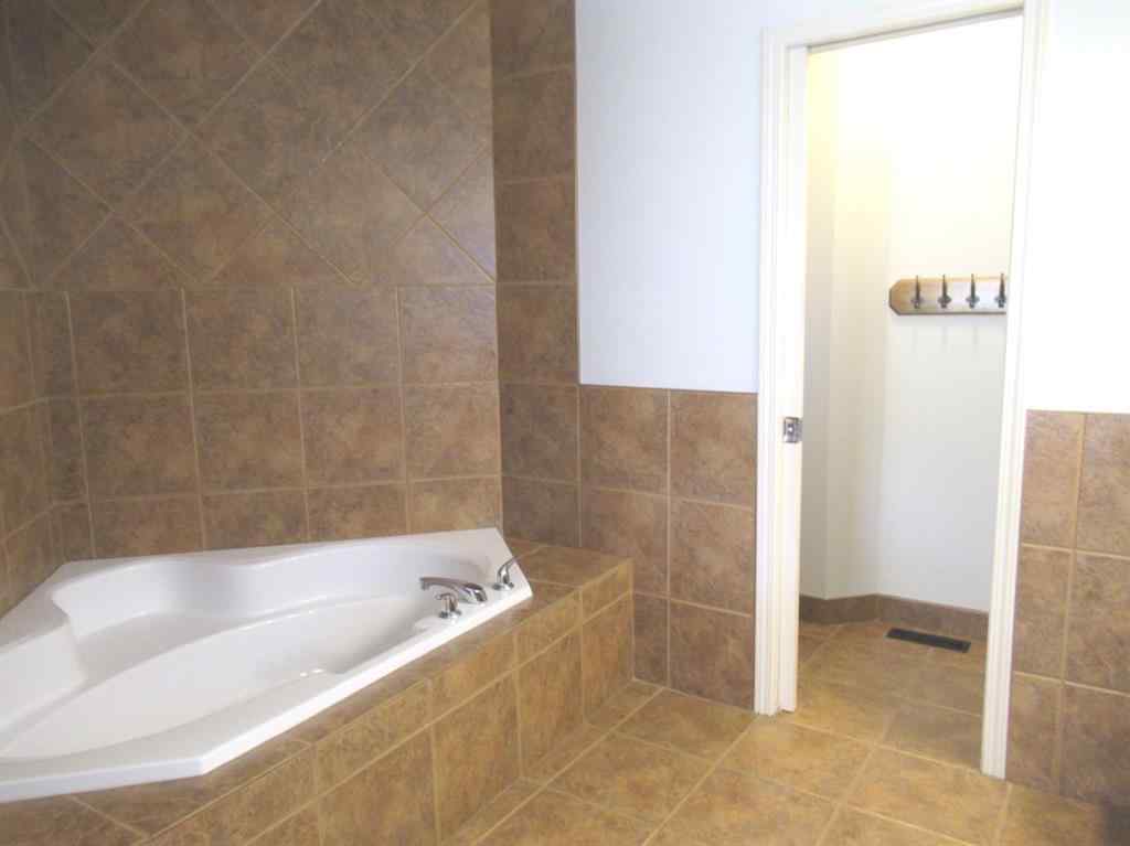 MLS® A2265627 - 105 Cimarron Park Circle  in Cimarron Okotoks, Residential