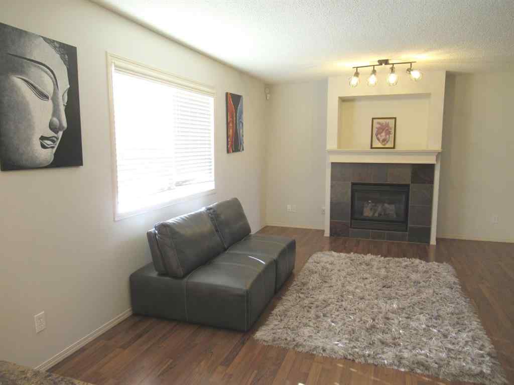 MLS® A2265627 - 105 Cimarron Park Circle  in Cimarron Okotoks, Residential