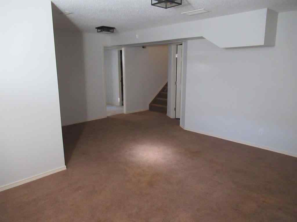 MLS® A2265627 - 105 Cimarron Park Circle  in Cimarron Okotoks, Residential