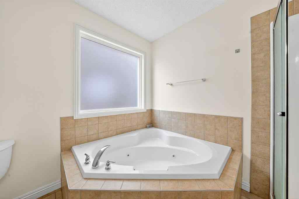 MLS® A2265634 - 320 Everbrook Way SW in Evergreen Calgary, Residential