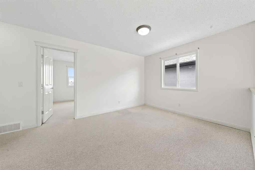 MLS® A2265634 - 320 Everbrook Way SW in Evergreen Calgary, Residential