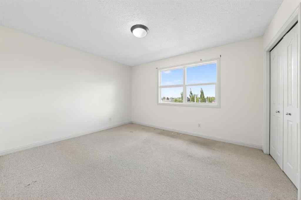 MLS® A2265634 - 320 Everbrook Way SW in Evergreen Calgary, Residential