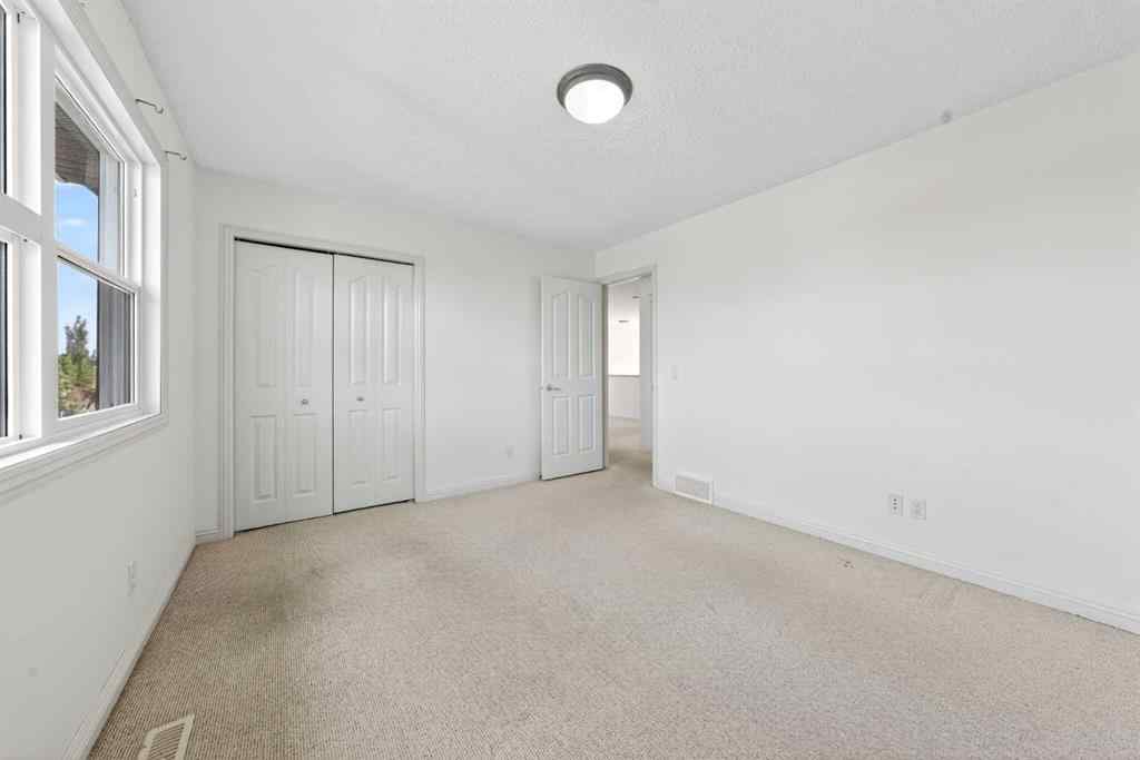 MLS® A2265634 - 320 Everbrook Way SW in Evergreen Calgary, Residential