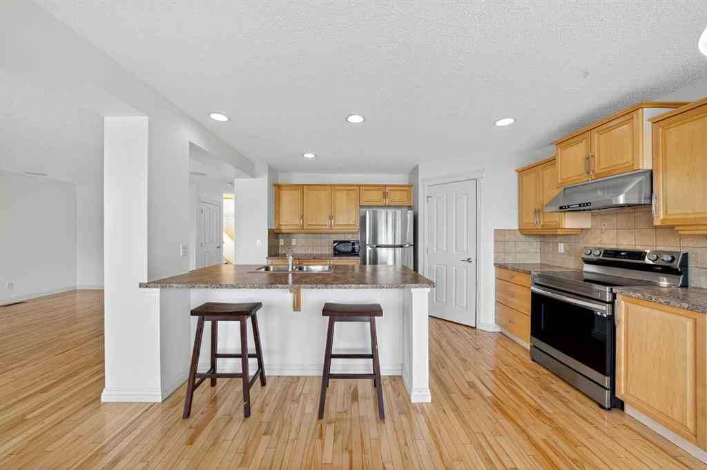 MLS® A2265634 - 320 Everbrook Way SW in Evergreen Calgary, Residential