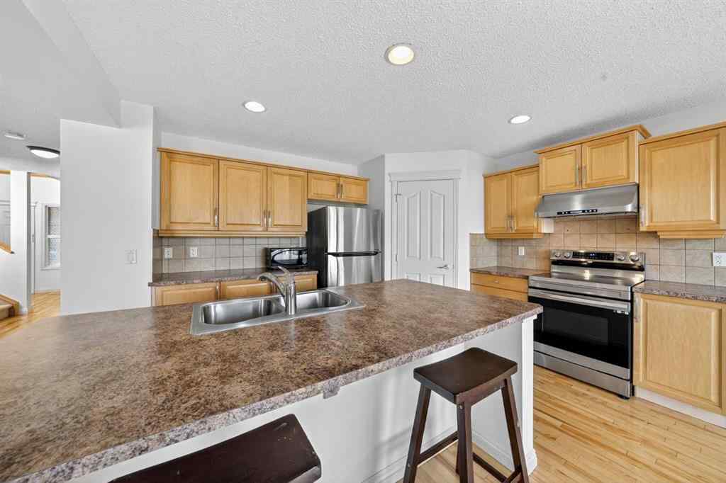 MLS® A2265634 - 320 Everbrook Way SW in Evergreen Calgary, Residential