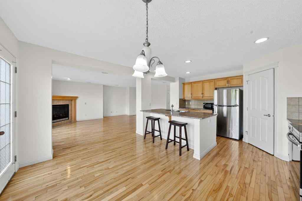 MLS® A2265634 - 320 Everbrook Way SW in Evergreen Calgary, Residential