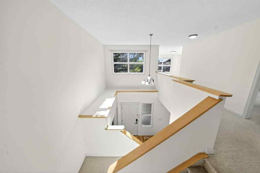 MLS® A2265634 - 320 Everbrook Way SW in Evergreen Calgary, Residential