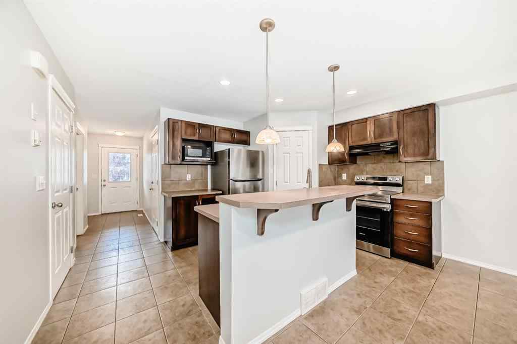 MLS® A2265635 - 104 Country Village Lane NE in Country Hills Village Calgary, Residential