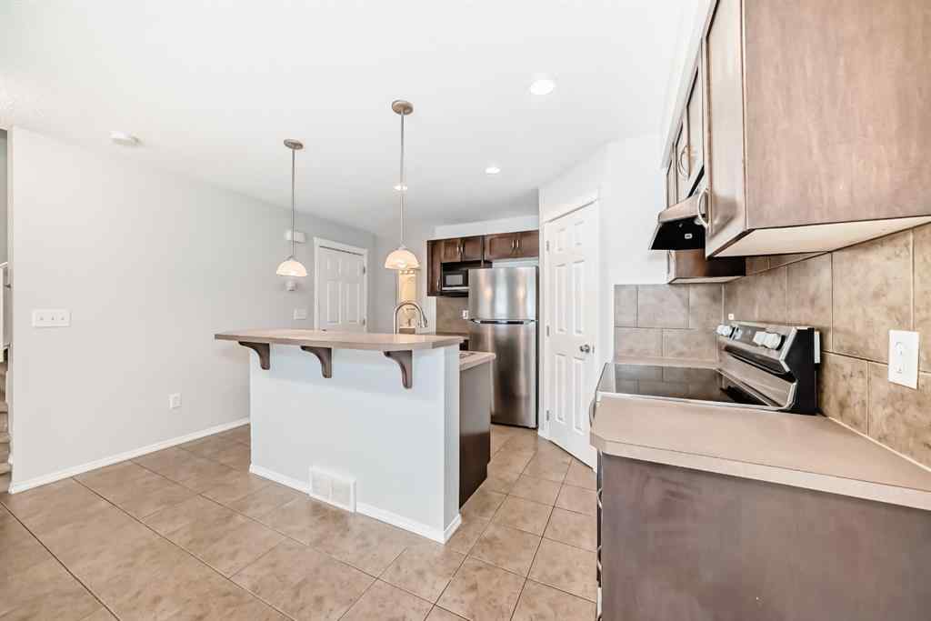 MLS® A2265635 - 104 Country Village Lane NE in Country Hills Village Calgary, Residential