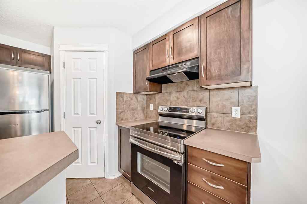 MLS® A2265635 - 104 Country Village Lane NE in Country Hills Village Calgary, Residential