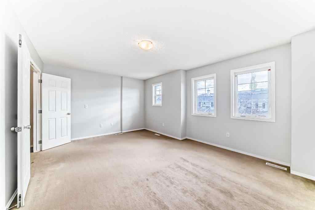 MLS® A2265635 - 104 Country Village Lane NE in Country Hills Village Calgary, Residential