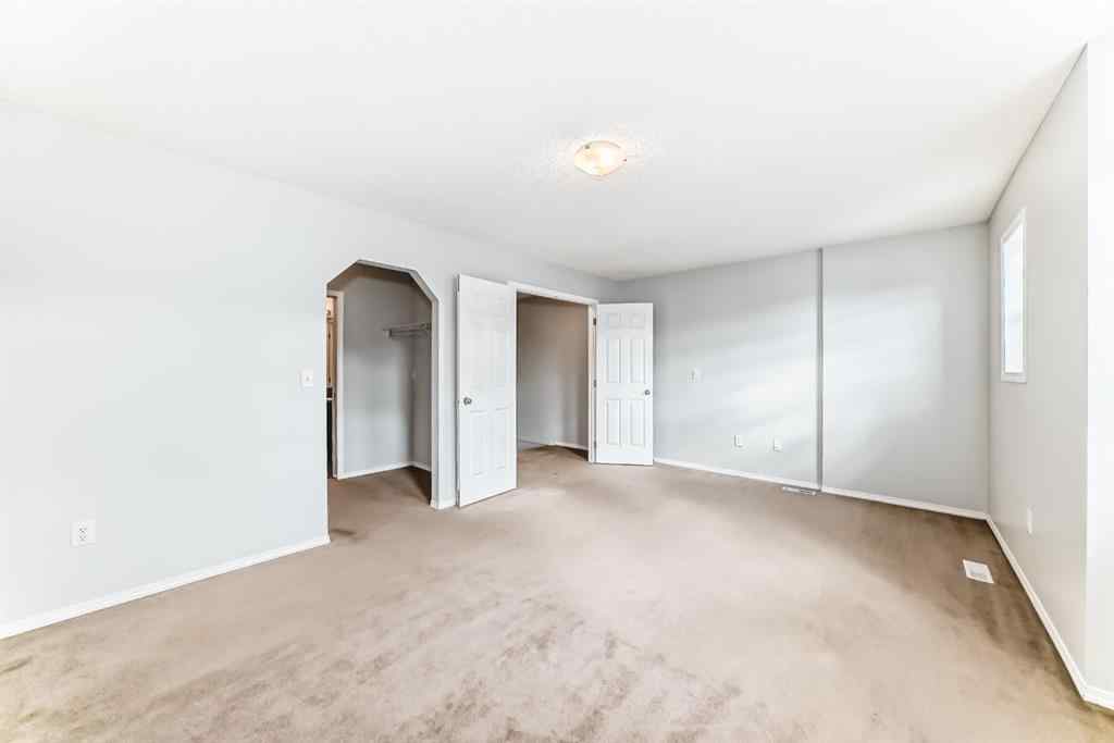 MLS® A2265635 - 104 Country Village Lane NE in Country Hills Village Calgary, Residential