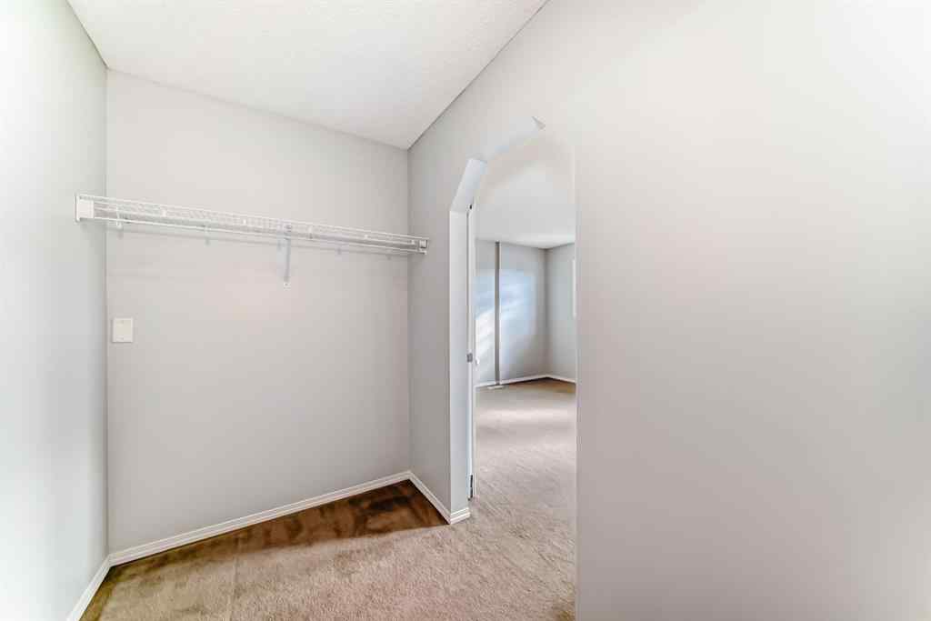 MLS® A2265635 - 104 Country Village Lane NE in Country Hills Village Calgary, Residential