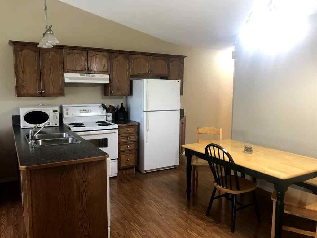 MLS® A2265647 - 7017 Deer Street  in College Heights Lacombe, Residential