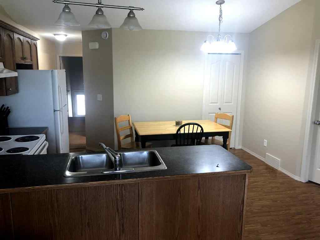 MLS® A2265647 - 7017 Deer Street  in College Heights Lacombe, Residential