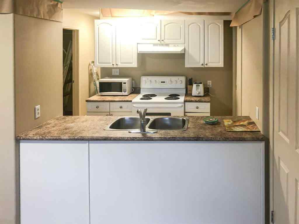 MLS® A2265647 - 7017 Deer Street  in College Heights Lacombe, Residential