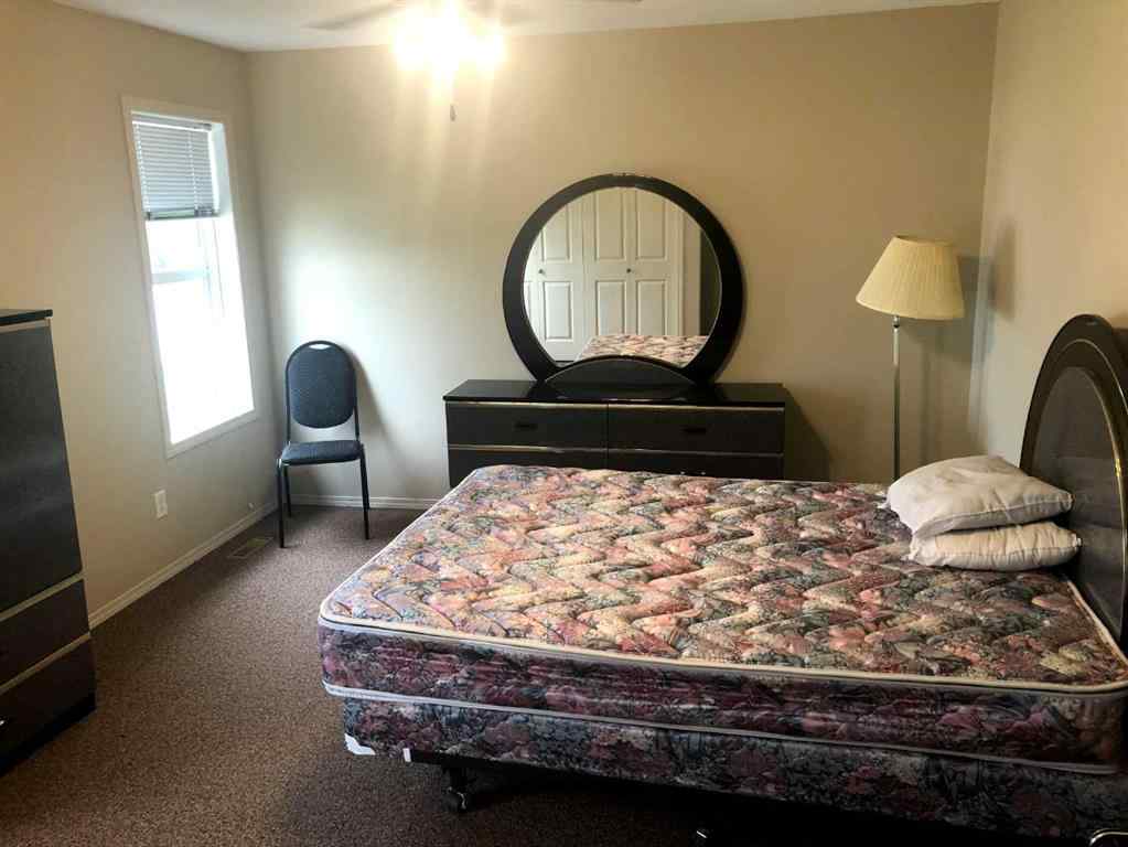 MLS® A2265647 - 7017 Deer Street  in College Heights Lacombe, Residential