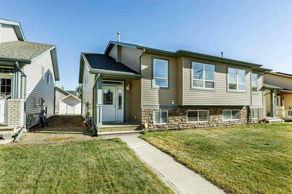 MLS® A2265650 - 7019 Deer Street  in College Heights Lacombe, Residential