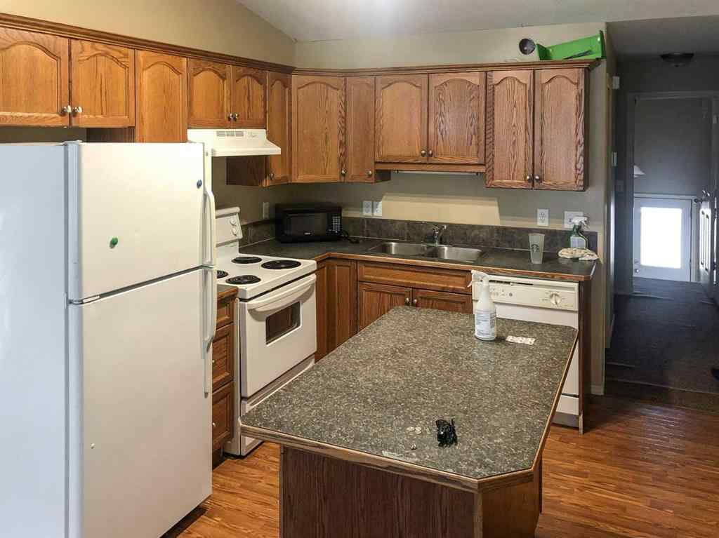 MLS® A2265650 - 7019 Deer Street  in College Heights Lacombe, Residential