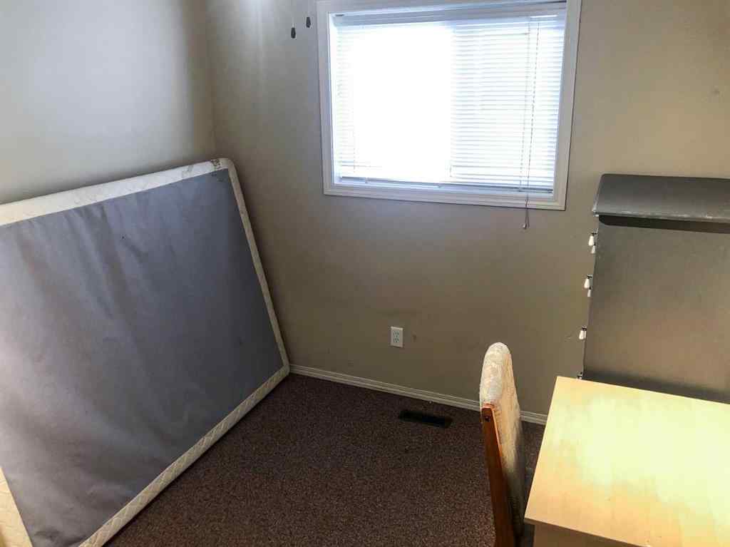 MLS® A2265650 - 7019 Deer Street  in College Heights Lacombe, Residential