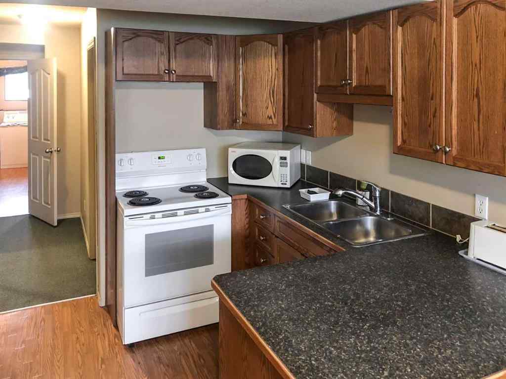 MLS® A2265650 - 7019 Deer Street  in College Heights Lacombe, Residential