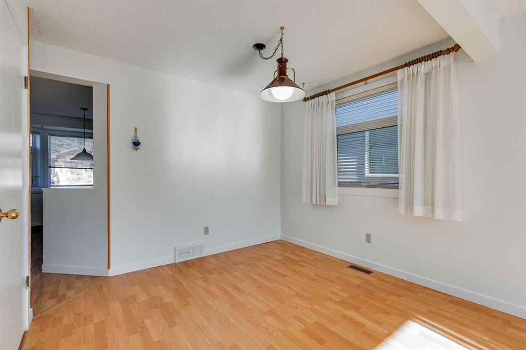 MLS® A2265651 - 76 Woodstock Road SW in Woodlands Calgary, Residential