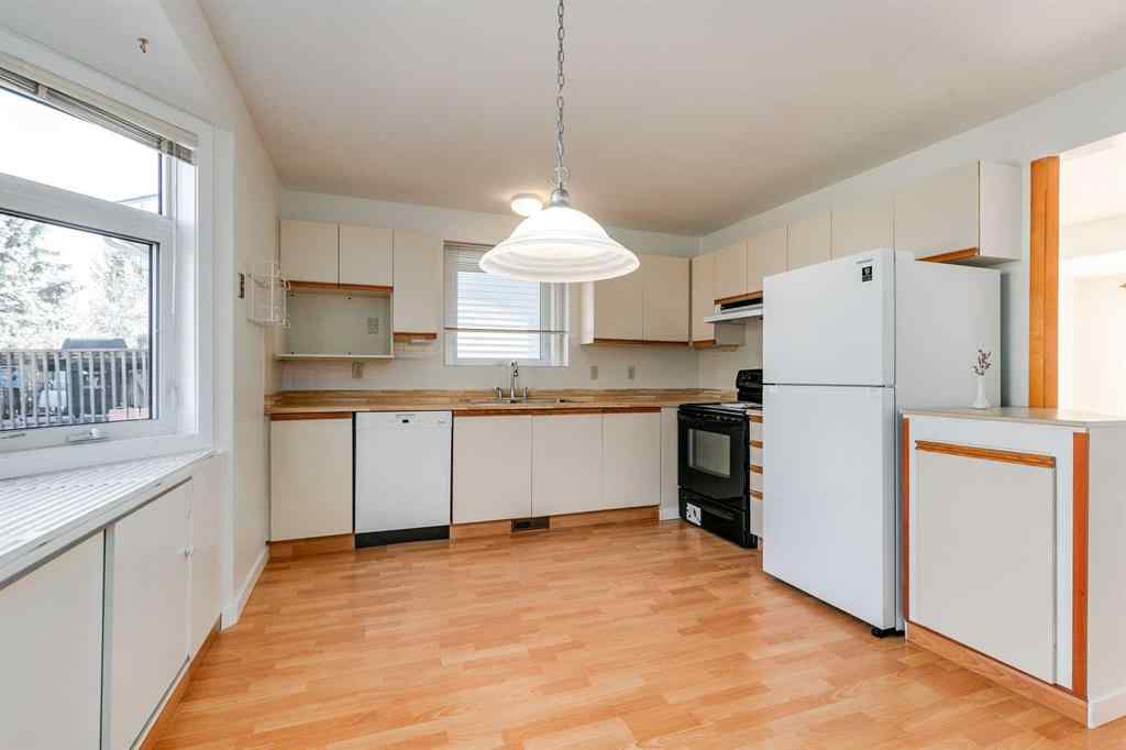 MLS® A2265651 - 76 Woodstock Road SW in Woodlands Calgary, Residential