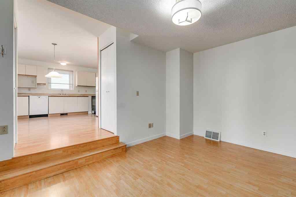 MLS® A2265651 - 76 Woodstock Road SW in Woodlands Calgary, Residential