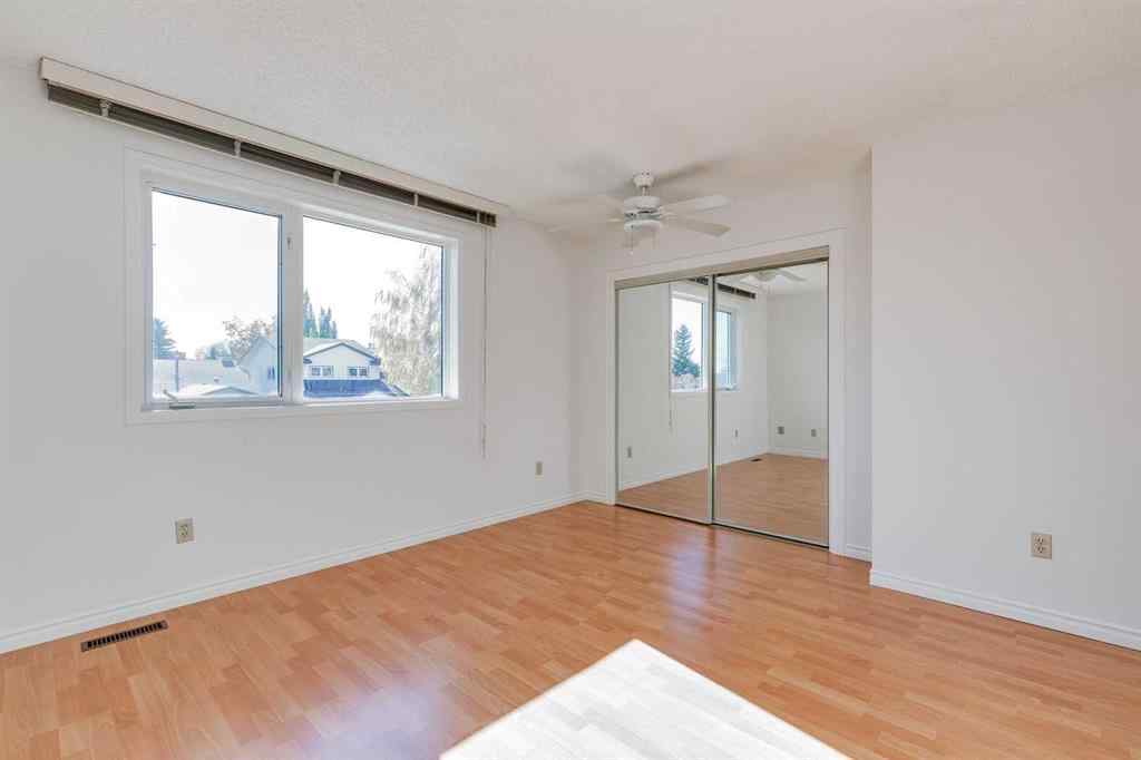 MLS® A2265651 - 76 Woodstock Road SW in Woodlands Calgary, Residential