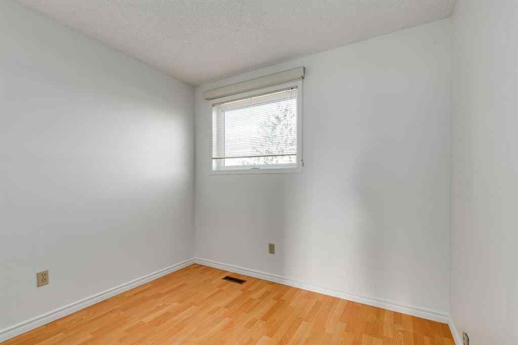 MLS® A2265651 - 76 Woodstock Road SW in Woodlands Calgary, Residential