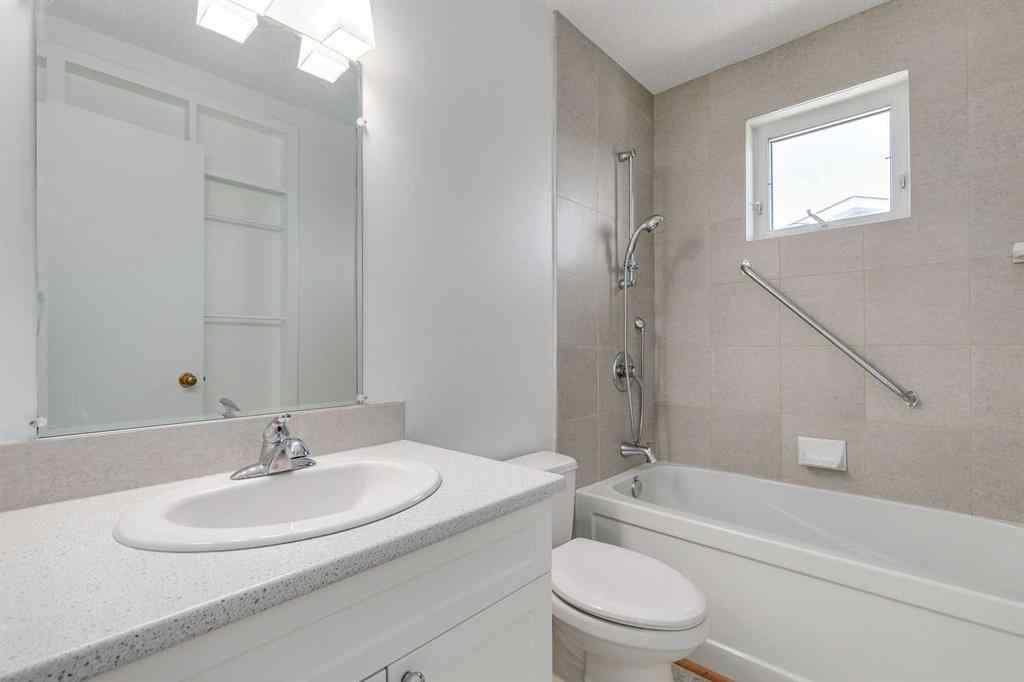 MLS® A2265651 - 76 Woodstock Road SW in Woodlands Calgary, Residential